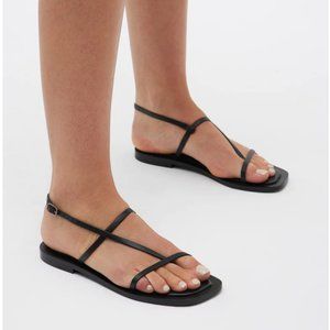 New in box black leather minimalist sandals, size 9 (39)